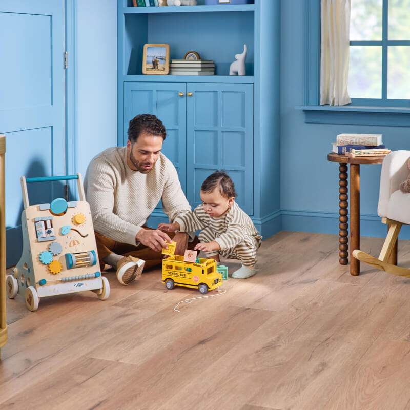 Dad child playing | Baker Valley Floors